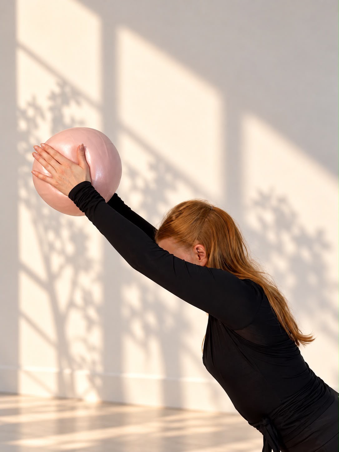 Rotation mit Ball über dem Kopf